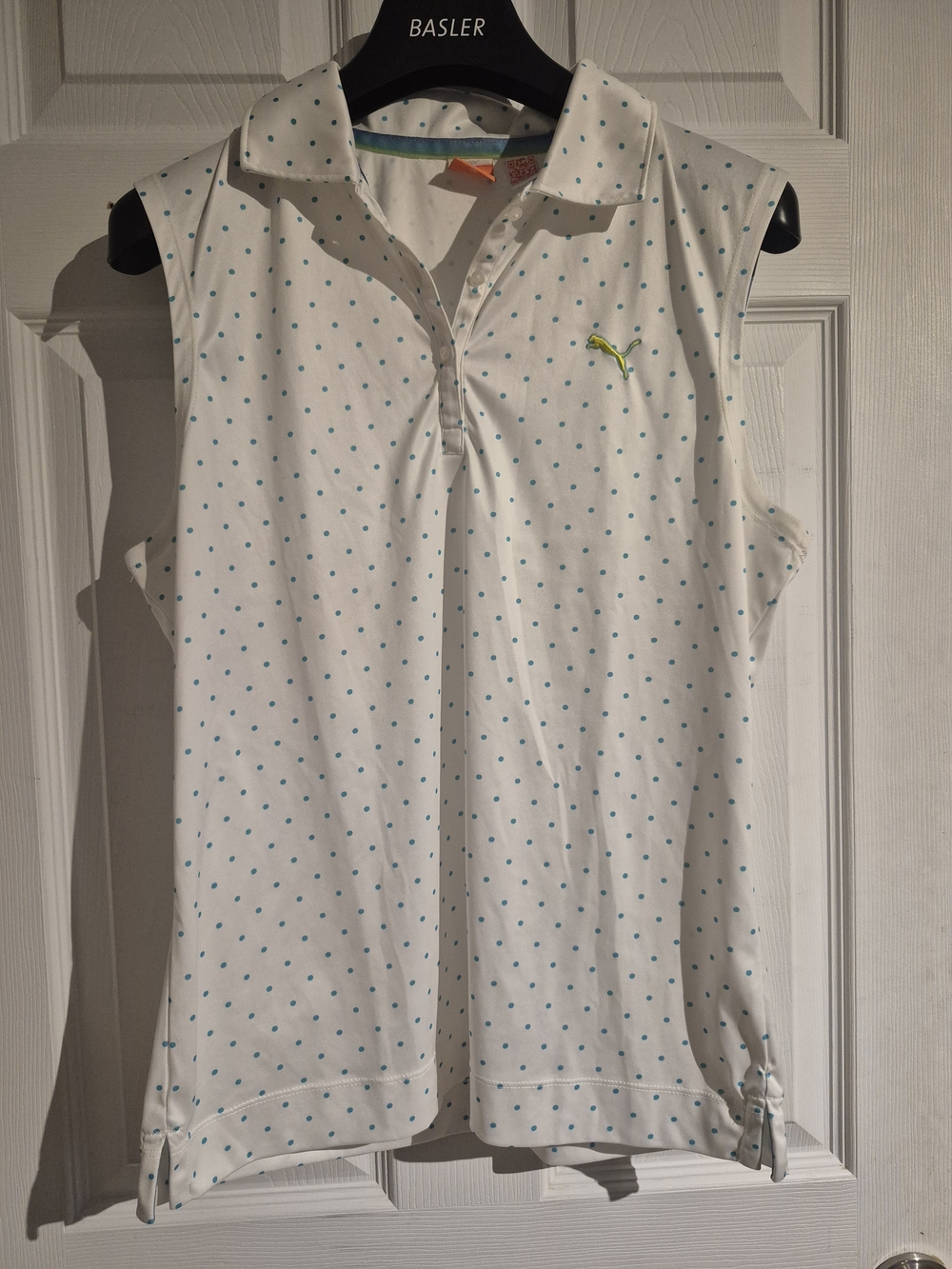 Puma Women’s White Sleeveless Polo with Teal Dot Print